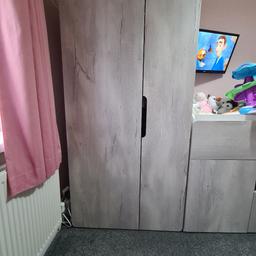 Wardrobe has 2 rails and 2 shelves... fits plenty in

Changing Unit has 1 draw and 1 shelf .. in the bottom left back corner the screw has lifted the wood as seen in the picture ... does not affect the use of the unit in any way.

Great for starting out in a baby room.

Wardrobe
Height 183.5cm
Depth 54.5cm
Width 90.5cm

Changing Unit
Height 96cm
Depth 54.2cm
Width 80.5cm

Pet and Smoke free home.

Collection from Heywood