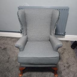 Has a couple of pulls to fabric.
wooden legs had signs of wear.

This chair although looks grey in images is actually green multi coloured.

UK Delivery Available.