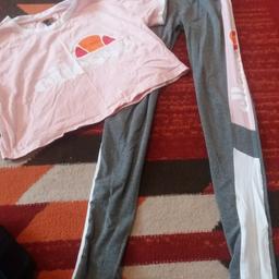 ellesse leggings set bottoms are size 8 top is size 10, logo on the leggings has cracked a bit .
