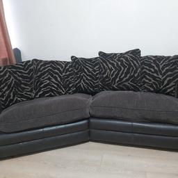 A fairly used 3 seater with dfs leather. no tear and in excellent condition