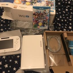I HAVE FOR SALE A WHITE NINTENDO WII U GAMES CONSOLE SUPER SMASH BROTHERS BUNDLE 

ITS LIKE NEW CONDITION NO MARKS OR FAULTS 

ITS ORIGINAL BOXED WITH ALL CABLES / WIRES AND COMES WITH THE SUPER SMASH BRO’S GAME 

ITS COMES WITH THE BASE UNIT AND THE HANDHELD UNIT ASWELL 

ITS FULLY WORKING GUARANTEED CAN BE TESTED BEFORE PURCHASE 

IF YOU NEED ANY MORE INFORMATION JUST MESSAGE ME 

I CAN DELIVER IN LEICESTER OR POST OUT OF LEICESTER