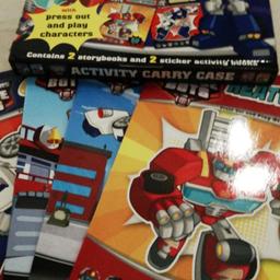 NEW TRANSFORMERS ACTIVITY CARRY CASE RESCUE BOTS  . 4 BOOK  WITH PRESS OUT AND PLAY CHARTERS. CONTAINS 2 STORYBOOK AND 2 STICKLER BOOK S  WAS £14.99   NOW SALE PRICE £4 DO PAYPAL POST AND DROP OFF FEW MILES SMALL COST LOVELY SET OF BOOKS.