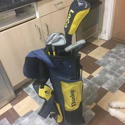 Full junior golf set no 5,7,9 a putter and another one!! Plus the bag which is easily carried with padded shoulder straps stand and top cover this was used but in good condition and for left handed kids aswell also has golf balls in one of the compartments!suitable for ages 6-15depending on child’s height?navy blue and yellow
