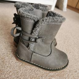 Grey zip up boots from Next. Toddler girls size 4

Good condition, worn only a handful if times before they were outgrown