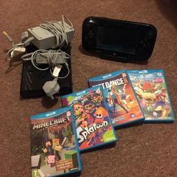 Wii U console all in working order.

Handheld Screen Controller - Charging Dock
Console
All power supplies and HDMI cable

Games - Minecraft, Splatoon, Just Dance 2017, and Mario Party 10.

All wiped and firmware up to date.