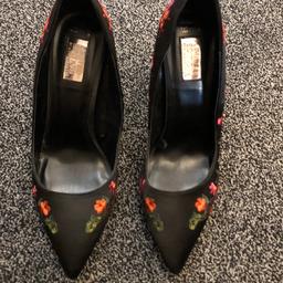 Size 6 . Used but in good condition . Black  and embroidered with multi coloured flowers