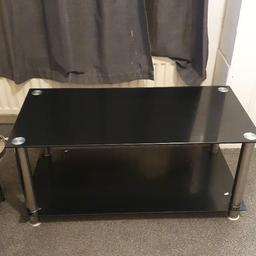 black
glass
coffee table
collected only