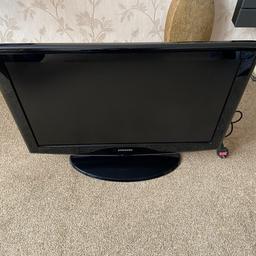 Samsung 32” tv working and on a swivel stand and with a remote can be wall mounted 