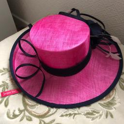 Cerise and navy hat with navy flower detail beautiful hat only worn once for a wedding and then stored away!! Originally cost £129!! From smoke free home. Cash on collection.