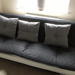 Sofa bed
Grey and white leather
Spring one side on bed slightly gone but not noticeable when sat on
Very comfortable both as a sofa and bed
