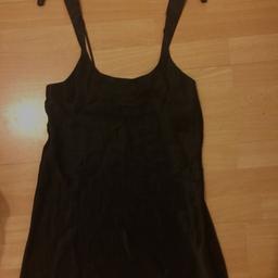 Black silky (actually polyester) slip nightdress, with rose pattern around the neckline (see second pic). Worn a couple of times but selling as it’s too small for me. Collect from Kingston KT1 or pay postage.