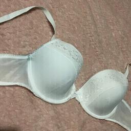 Marks and Spencer’s white lace bra 

Worn a few times and stored Away . 

40b