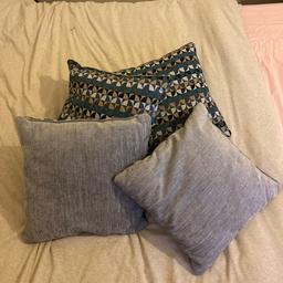 Grey on one side and blue pattern on reverse
5 cushions