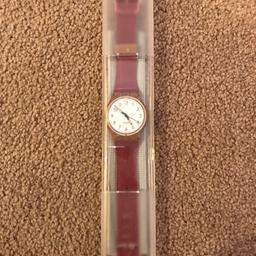 Ladies swatch watch, used but in good condition and fully working. In box.