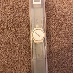 Ladies swatch watch. Used but Excellent condition. In box. Fully working.