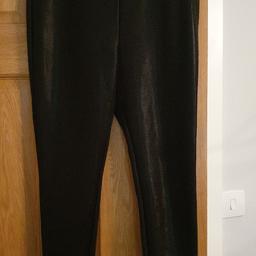 Black shiny leggins, size 16.
very good condition.
