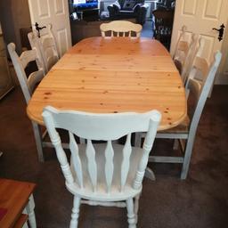 Shabby chic dining table and 6 chairs

Length 62 1/2 “ extends to 79 1/2”, 39” width , height 30” .