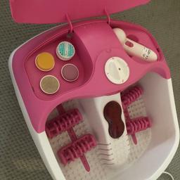 Feet massager with three settings plus a pedicures set that includes four pieces . It has UV light therapy and air drying .