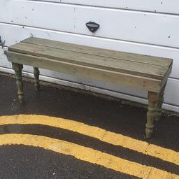 treated wood and nice turned legs. approx 113cm wide. inside or out.  free local delivery.