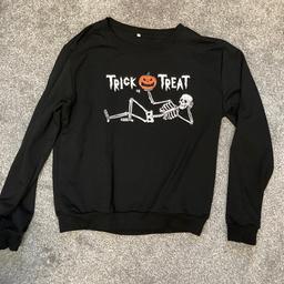 Halloween jumper from shein 
Great condition 
Literally brand new only wore 2 times 

It’s size L but fits like M because it’s short