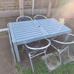 extended garden table and 4 chairs , free local delivery