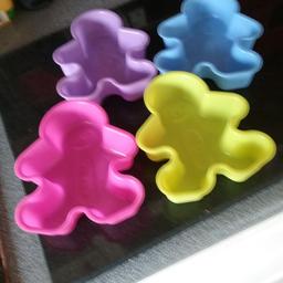 set of 4 gingerbread man cake moulds never been used
