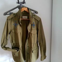 jacket spring Ralph Lauren khaki color size Xs but normal S or small M , has a hidden hood zipped up inside the collar.