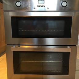 Top oven has a grill, bottom oven is fan assisted. All works fine but the top oven/grill control knob is a bit delicate. Instruction manual. Cash on collection from Clawddnewydd area