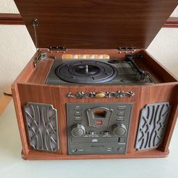 On offer a versatile All in one stereo.
Finished in retro look. All in working order and ready to use.
Comes with record player, CD player, Cassette tape and radio. With built in speakers