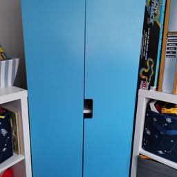 IKEA Stuva Children's Wardrobe with blue doors.

Condition is "Used" but in good condition.

Height 128cm, depth 51cm, width 60cm.

Has a drawer that pulls out at the bottom.

Collection only.

Comes from smoke-free, pet-free and illness-free home.

￼