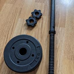Steel Barbell set. 

Total length:                 152cm 5ft
Each sleeve length:     30cm 11.5 inch
Bar Weight:                  5.5 kg

Comes with 2 X 1kg vinyl plates and metal spin collars.
Bar weighs 5.5kg. 7.5kg with both plates.
Plates are vinyl.