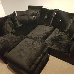 black crushed velvet style corner sofa.around 1 year old.good condition and clean.1 button missing off 1 cushion.buyer to collect.will need a van.ill will get it outside.you will need to load it(bloody covid)..does breakdown for loading.also includes the swivel chair and a footstool

new update. the sofa is loaded on my van so I'm happy to include local delivery for free or at cost for further areas.

delivery will be limited to outside only. buyer to unload. sofa has been spray sanitised

