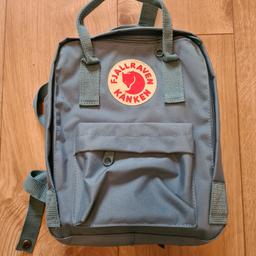 Fjallraven Kanken Blue Mini Backpack Rucksack. Had for about 5 years but worn used perhaps three times as just not my style. Blue in colour, great condition with only a few scuffs. All zips and poppers working fine.

Thanks for looking