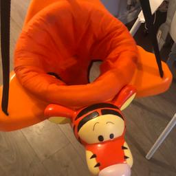 Tigger door bouncer, in really good condition & our son loved going in it!