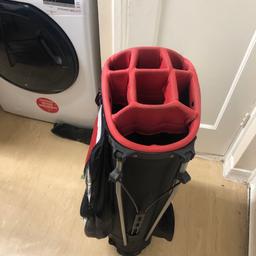 A Nike golf bag, used but in very good condition. No tears, all zips pockets in very good working order. Lightweight solid bag.
