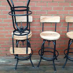 4 swivel stools with walnut seats. 2 years old in great condition. £340 new.