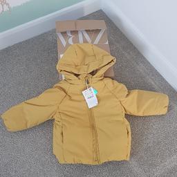 Brand new Zara Childrens coat in yellow, it has an elasticated waist and detachable hood, very well insulated. Brand new with tags, unwanted present.