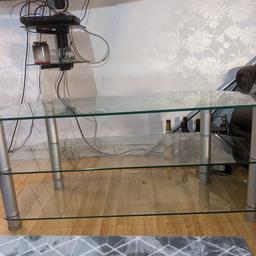 Glass tv unit in good condition. aprx 1 metre long
