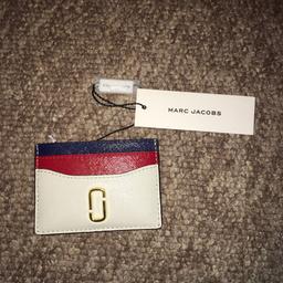 New with tag! 

Marc Jacobs card holder in blue, red and white.
