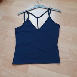 Ladies top size M, never worn, in great clean condition