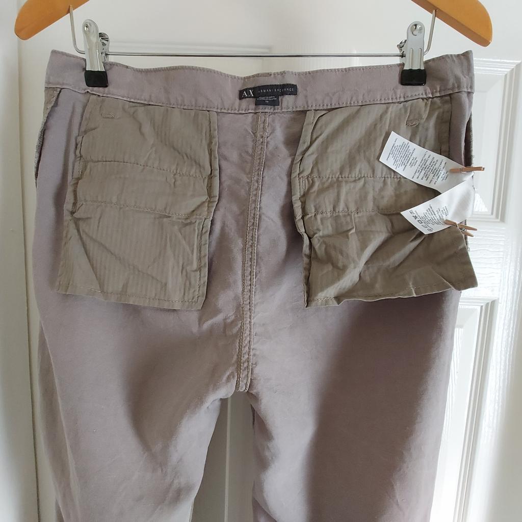 Trousers A|X"Armani Exchange” Pale Grey Colour New Without Tags

Actual size: cm and m

Length: 1.02 m measurements from waist front

Length: 1.05 m measurements from waist back

Length: 1.02 m side from waist

Volume Waist: 80 cm – 84 cm

Volume Hips: 90 cm – 92 cm

Size: Eur 28

Body: 73 % Lyocell
 27 % Linen

Exclusive of Decoration

Made in India