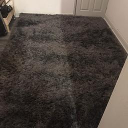 Grey rug width 2.1 meters length is 3 meters