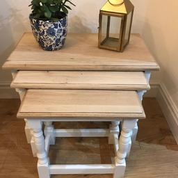 Solid oak nest of tables.
Set of three lovely painted tables. Colour: antique white with sanded tops.

Size: largest table
Length 59cm
Width 34cm
Height 41cm
The two other tables stack underneath
