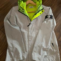 Limited addition reflective stone island jacket worn a couple of times in excellent condition age 12 yrs cost over £500