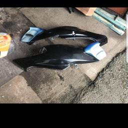 no cracks
each panel has a broken lug but fit bike fine theres also another set of rear panels to be used for parts 
also have underseat panels and rear light surround
offers
need gone