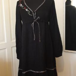Cute tunic dress, size 10 but fits 12Uk, navy blue colour, barely worn in e cellent condition.