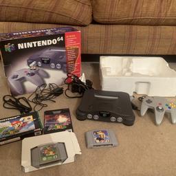 N64 with all wires and controller
2 games  - one boxed with manual