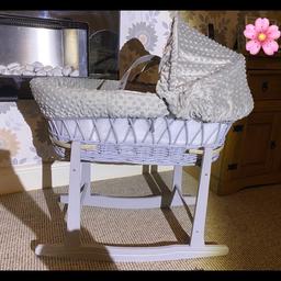 Padded grey wicker moses basket & rocking stand, excellent condition, brought for £60.