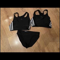 Black swimsuit. Very good condition. 2 x top 1x bottoms