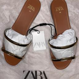 Zara Women’s Flat Vinyl Sandals. 

Size: UK 5
Heel height: 1.3cm/0.5”

Brand new with tags and dust bag. 

Available for immediate collection from M21, can deliver for free within Manchester or can post for charges elsewhere.